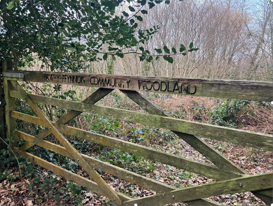 Gate with writing Pant y Ffynnon Community Woodland