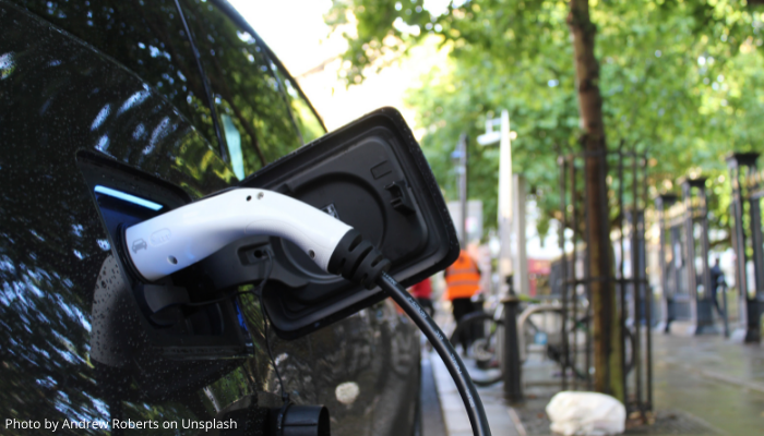 Picture of an electric car being charged