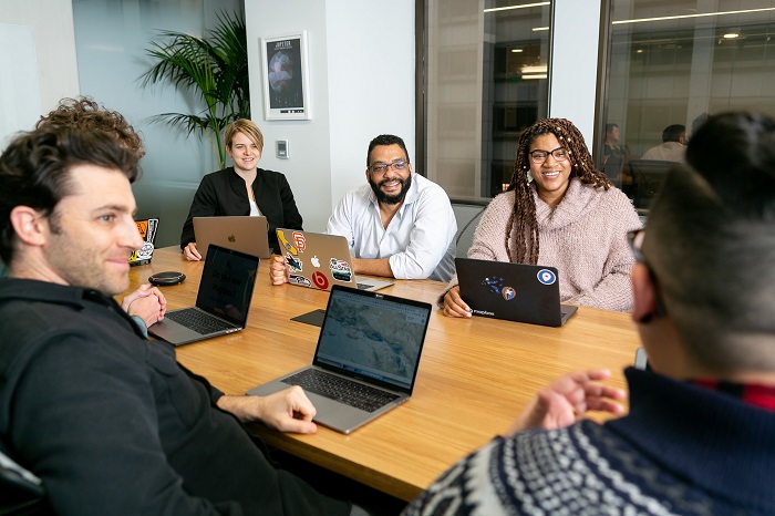People sitting around a table at work