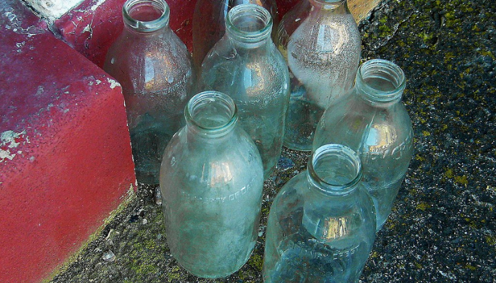 Empty milk bottles on doorstep