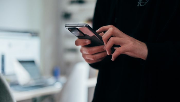 Someone using a mobile phone
