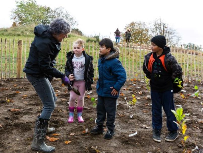 People planting Tiny Forest Caerffili