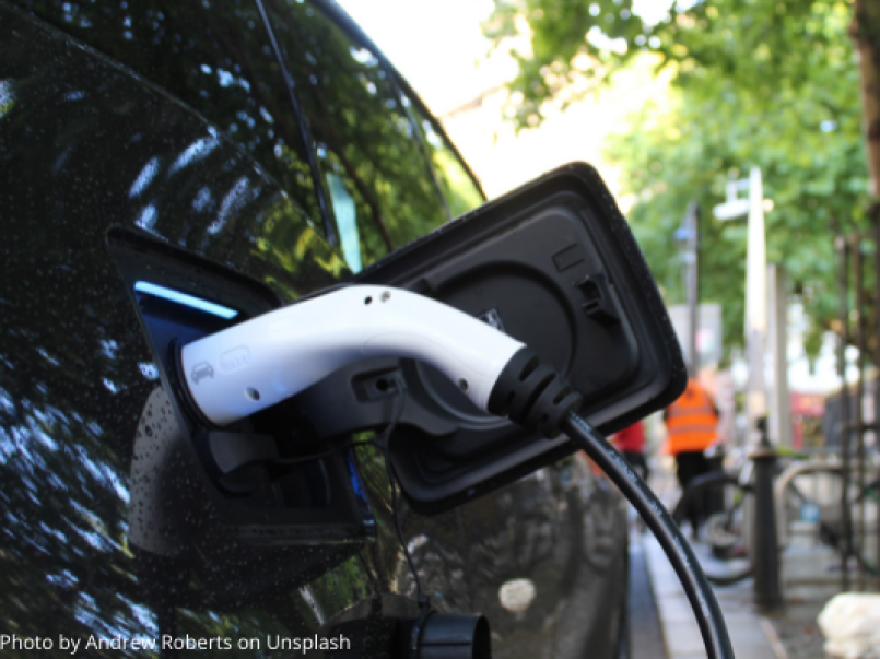 Electric car being charged