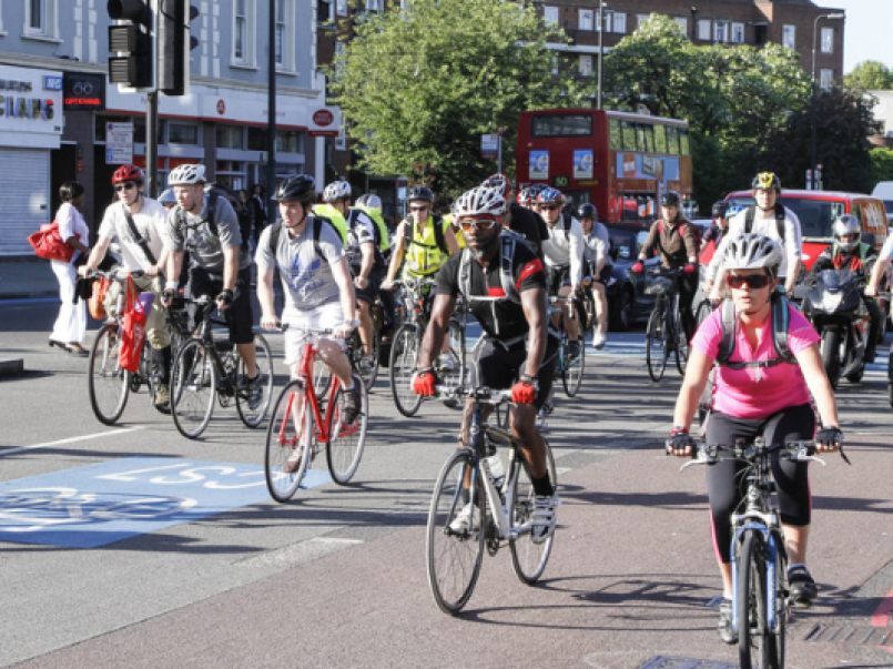 People cycling on a road
