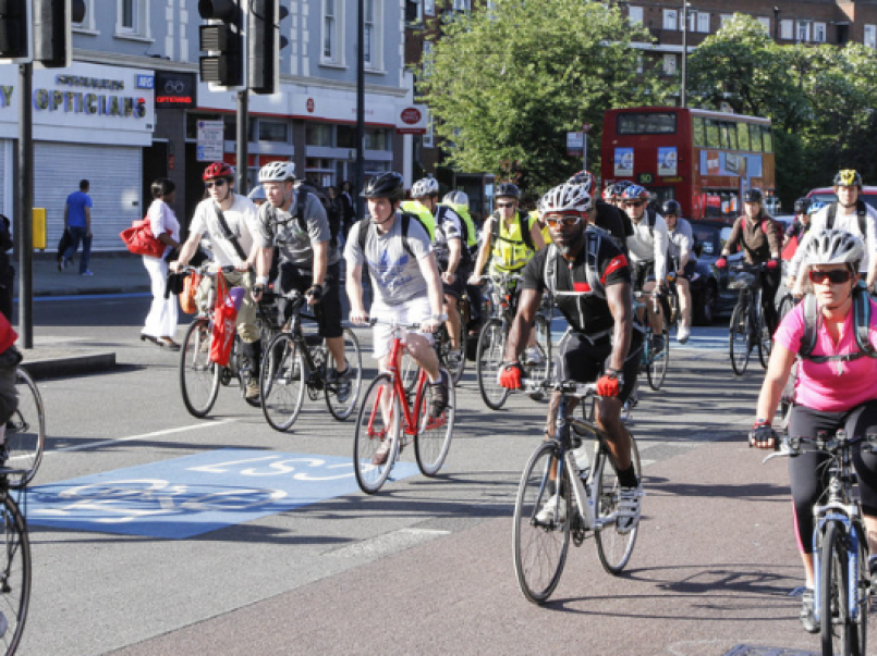 People cycling on a road