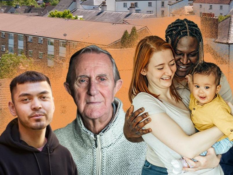 Group of people against a background of a housing estate
