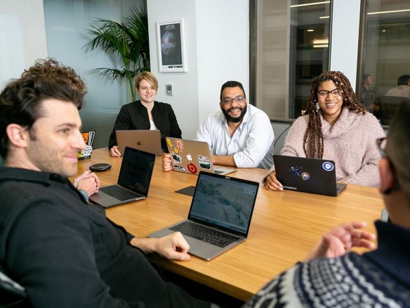 People at a meeting in an office