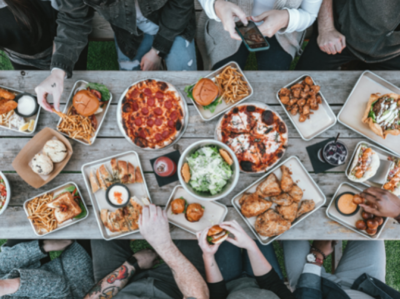 Photo of a table with plates and food