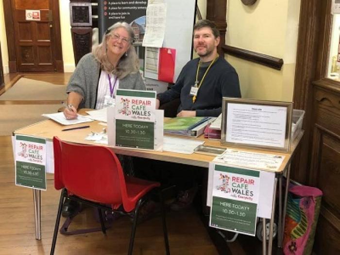 Two people at a repair cafe